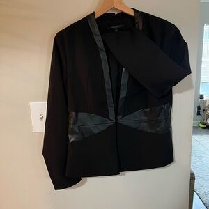 Cute black blazer with faux leather trim. Cute for the office of lunch date!